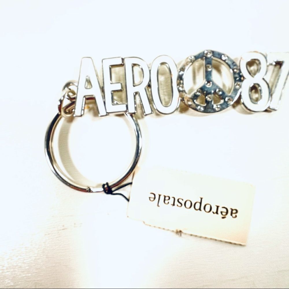 NWT Aeropostale Metallic Peace Sign White Keychain